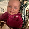 Jaxson joined the competition — help win amazing prizes! baby, infant, smile, blanket, clothing, face, portrait, cozy, warm, happy, child, apparel, fabric, soft, comfort, lying_down, cute, skin, head, expression