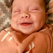 Ayda Grace joined the competition — help win amazing prizes! baby, smile, face, blanket, infant, closeup, sleeping, cozy, wrapped, pink, soft, child, cute, peaceful, newborn, skin, portrait, happy, dimples, resting
