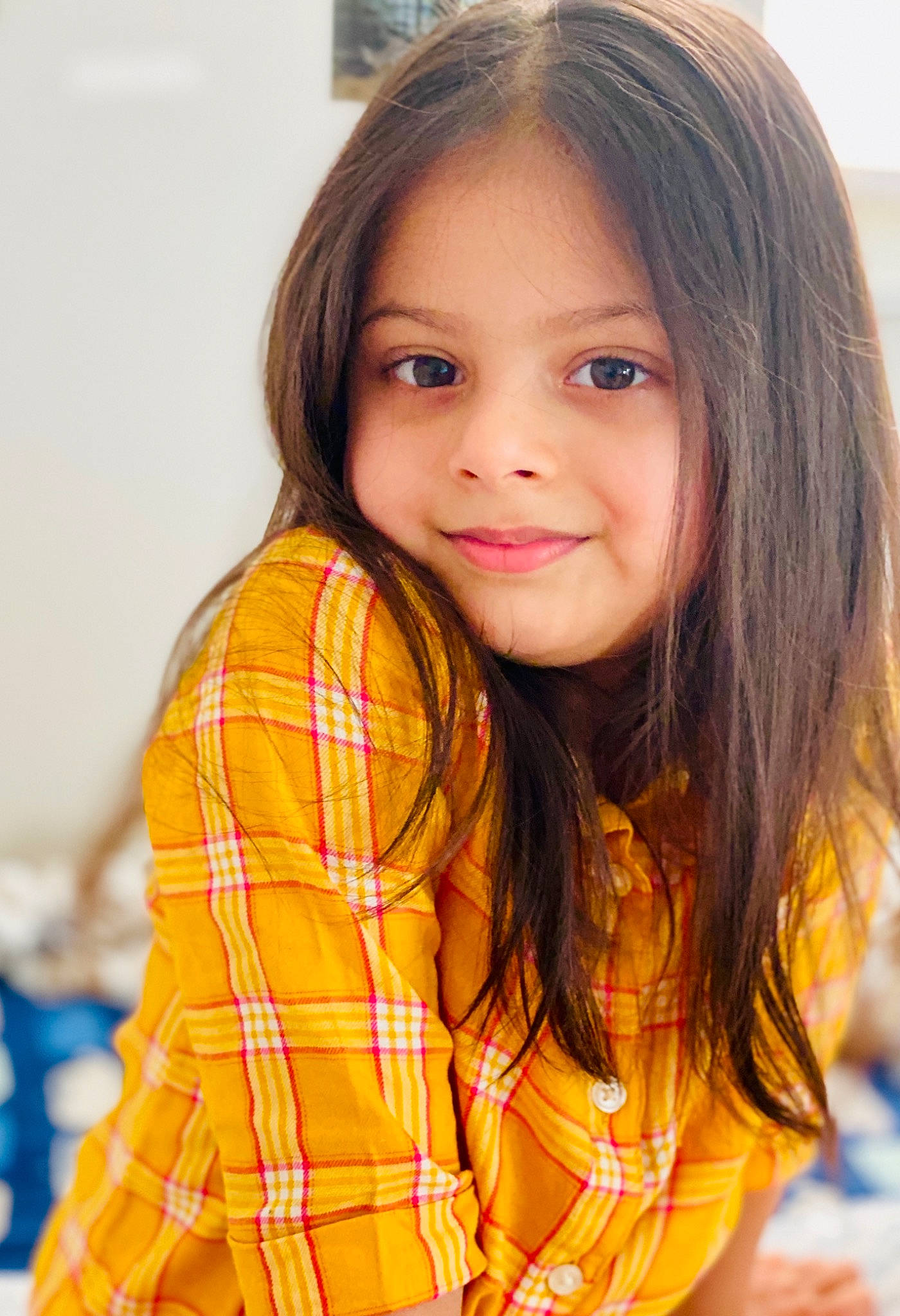 Ishna Brahme joined the competition — help win amazing prizes! black_hair, cheek, child, chin, eye, eyelash, facial_expression, fun, hairstyle, happy, iris, joy, lip, long_hair, nose, orange, person, plaid, skin, sleeve