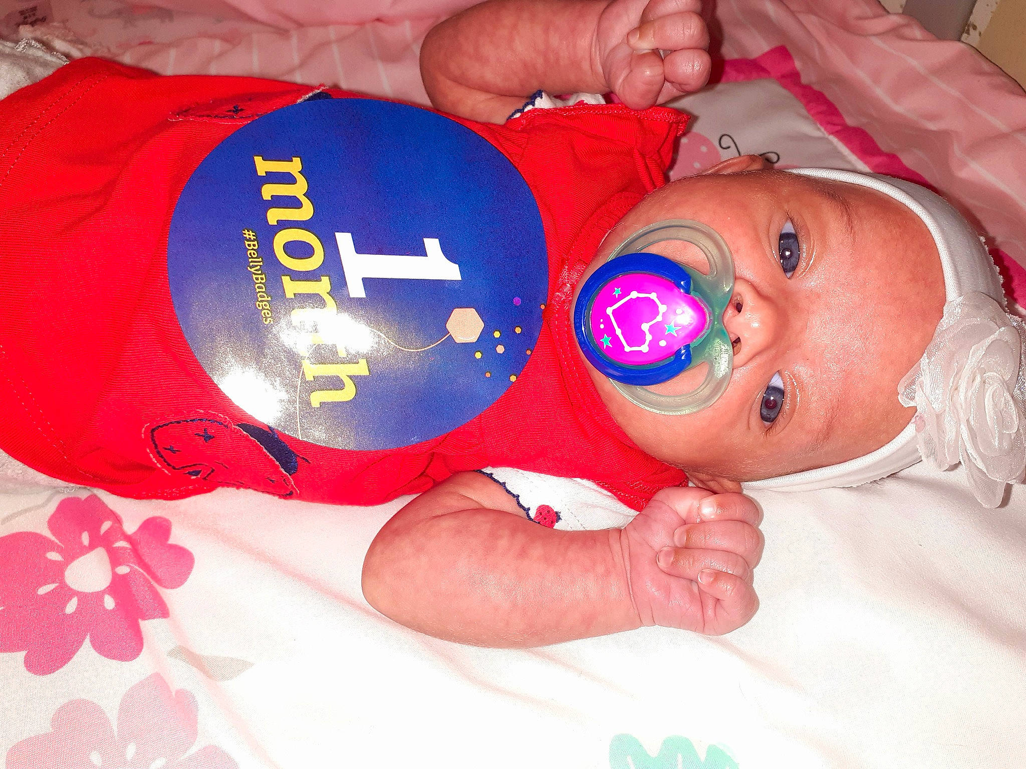 Unique is registered to the contest to win money with this photo: baby, baby_products, cap, child, fun, headgear, person, personal_protective_equipment, pink, product, toddler