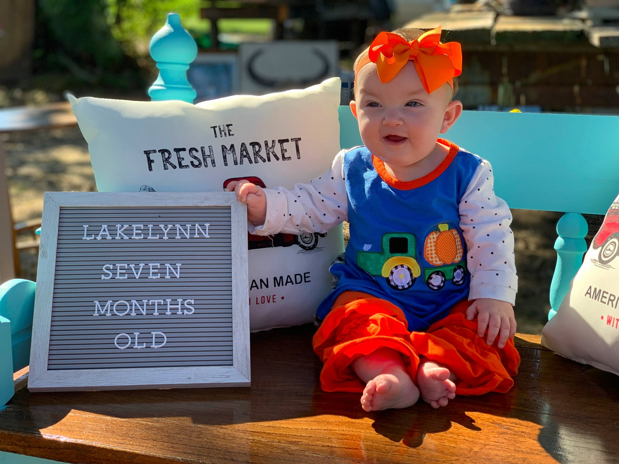 Lakelynn is registered to the contest to win money with this photo: baby, baby_toddler_clothing, child, event, flooring, font, fun, green, happy, headwear, leisure, mammal, people, person, photo_caption, play, recreation, room, sitting, toddler