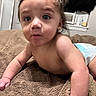 Daymon is registered to the contest to win money with this photo: air_conditioner, baby, bed, blanket, casual, child, curious, cute, diaper, expression, face, foot, hand, indoor, infant, person, room, skin, window, young