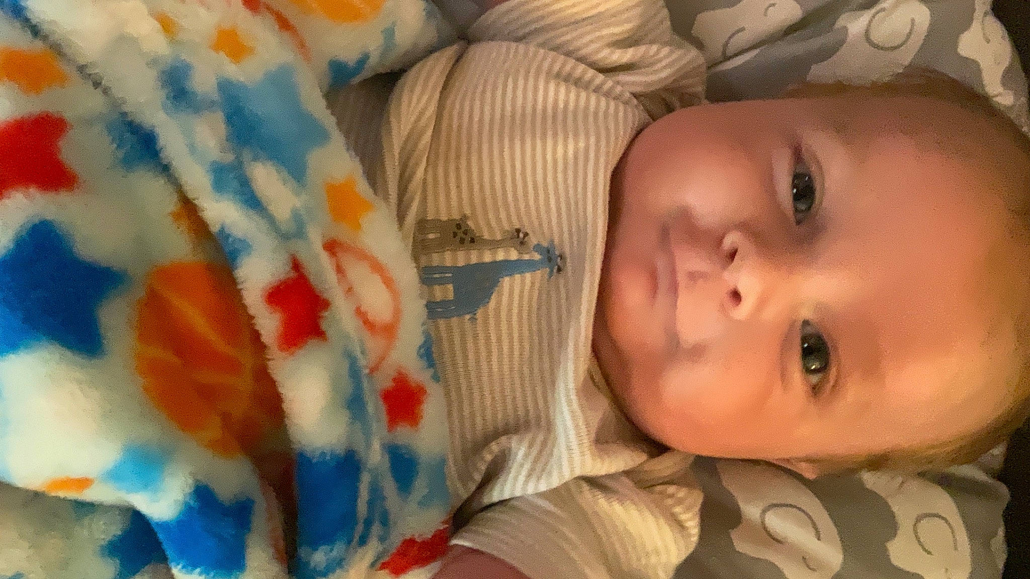 Westley is registered to the contest to win money with this photo: cheek, chin, eye, eyelash, face, facial_expression, head, human_body, iris, lip, mammal, mouth, nose, orange, organ, person, skin, sleeve, smile, textile