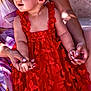 Mélia participe au concours pour gagner de l'argent avec cette photo : toddler, child, red_dress, butterfly_pattern, headband, flower_headband, smiling, holding_hands, adult_hands, portrait, outdoor, sunlight, skin, face, person, dress, happy, cute, baby, fashion