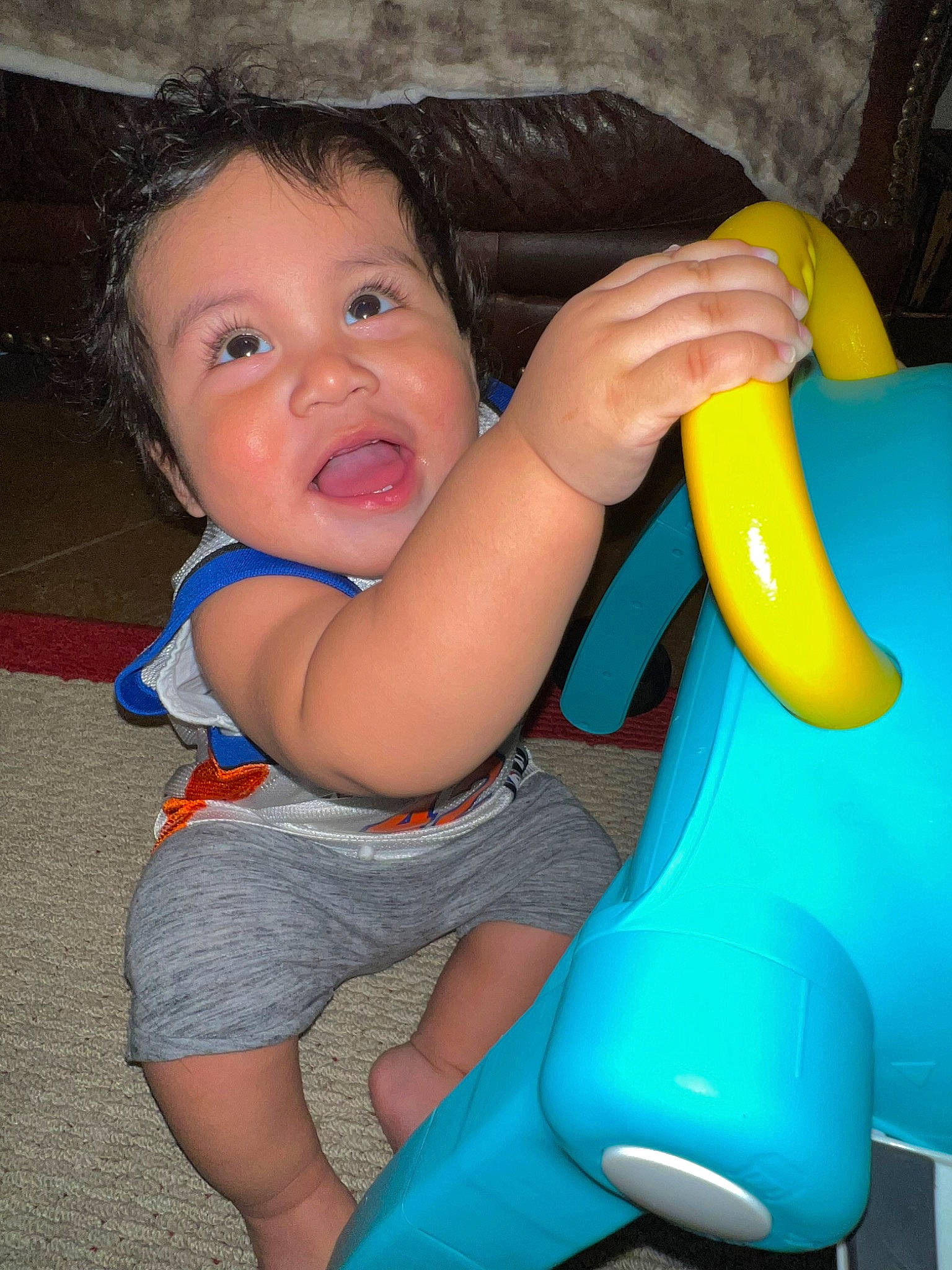 Uriah joined the competition — help win amazing prizes! baby_playing_with_toys, baby_toddler_clothing, child, facial_expression, finger, fun, hair, happy, head, human_body, leg, leisure, nose, organ, person, product, skin, smile, standing, summer