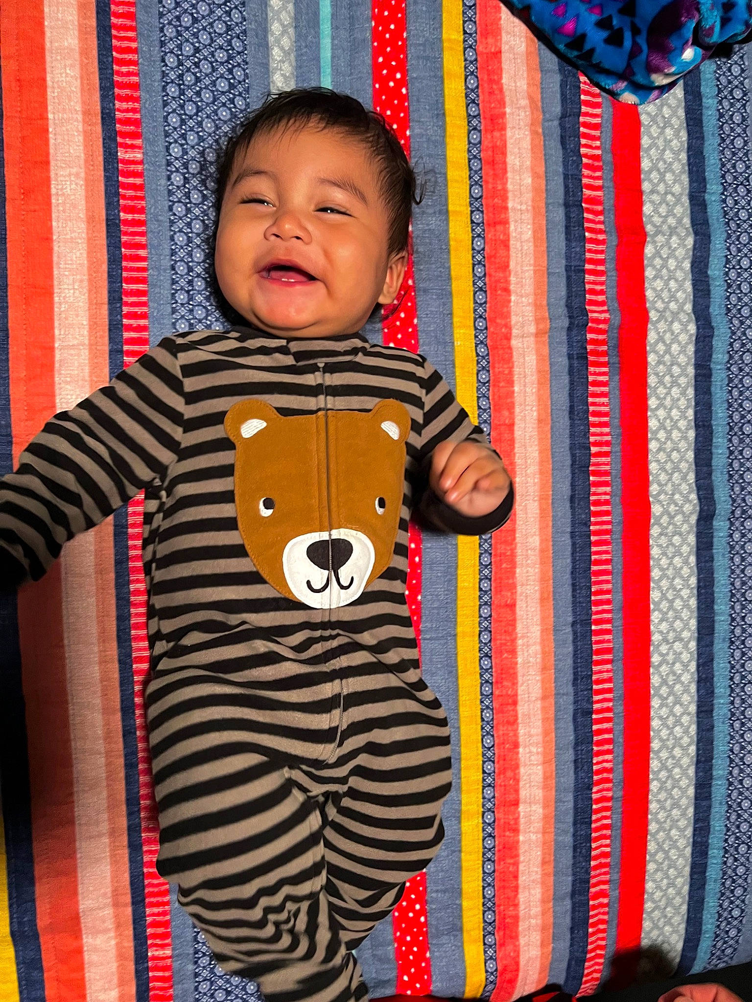 Uriah joined the competition — help win amazing prizes! baby_toddler_clothing, blue, child, curtain, hairstyle, happy, linens, magenta, orange, outerwear, pattern, person, product, rectangle, red, sleeve, smile, standing, t_shirt, textile