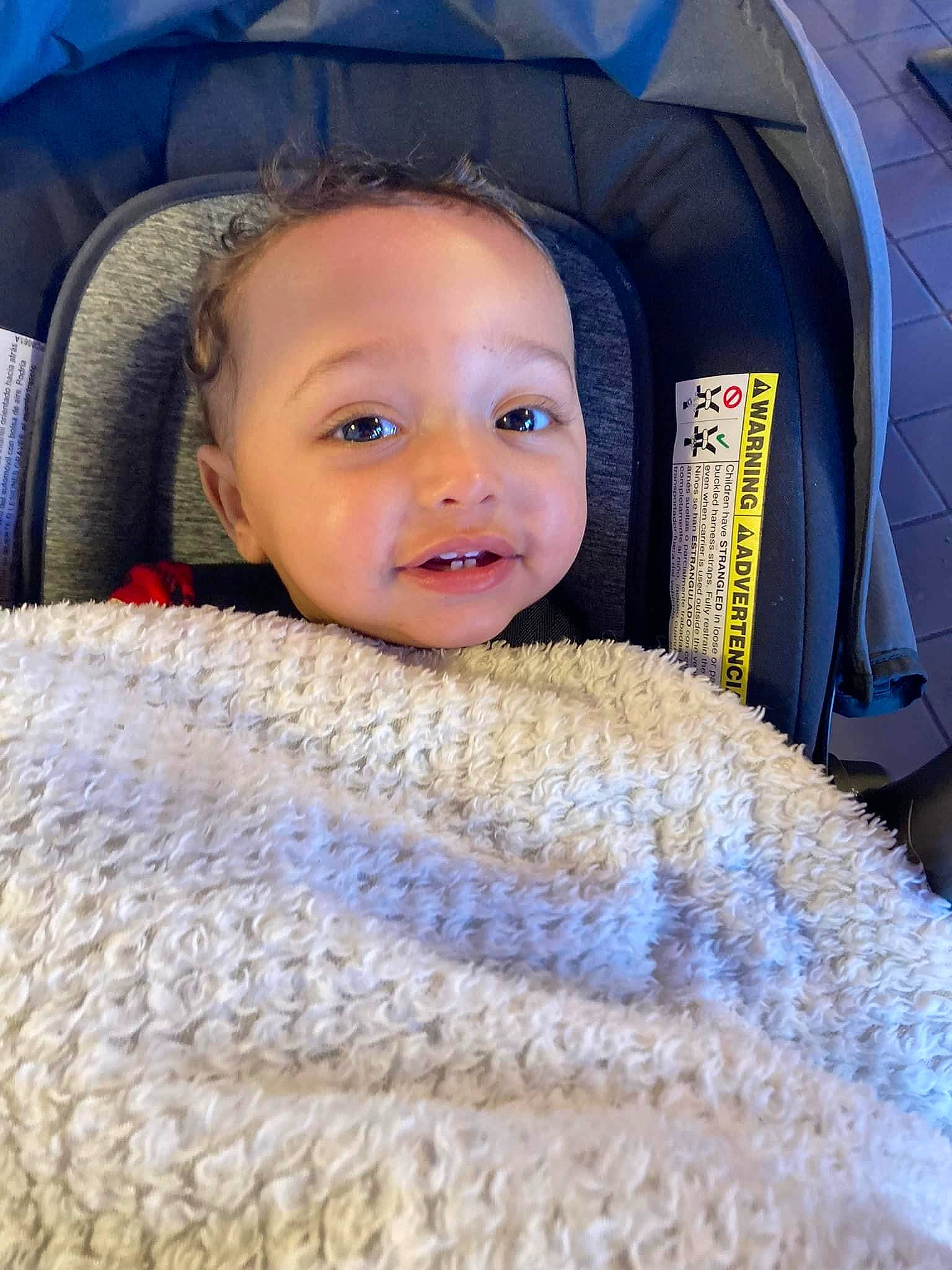 Cameron joined the competition — help win amazing prizes! auto_part, azure, baby, baby_products, blue, car_seat, child, comfort, electric_blue, fun, happy, linens, outerwear, person, product, smile, textile, toddler, vehicle_door, wool