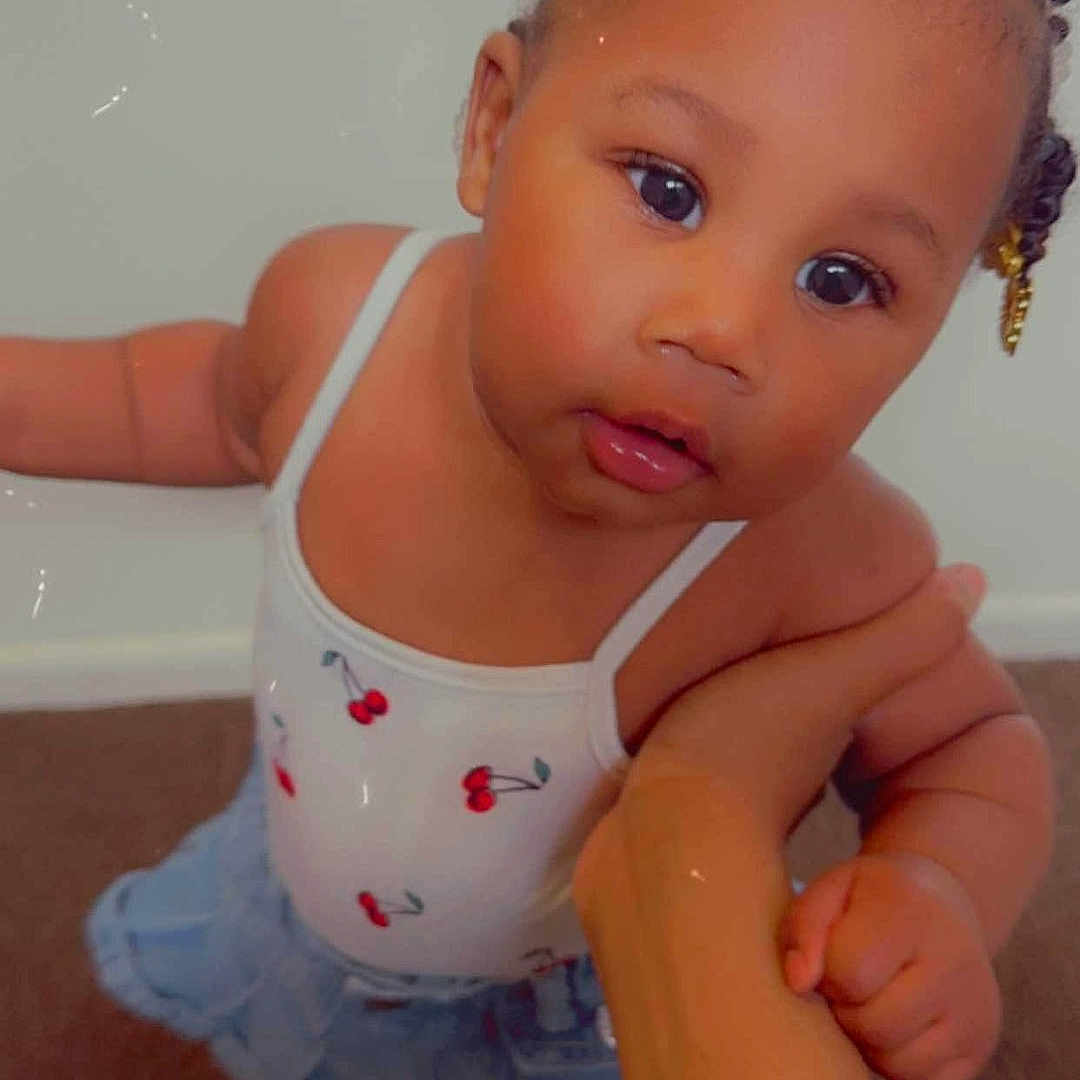Zamyra joined the competition — help win amazing prizes! accessories, baby, bodypart, clothing, dress, earring, face, finger, hair, hand, head, hosiery, jewelry, mouth, person, photography, portrait, shoulder, sitting, sock