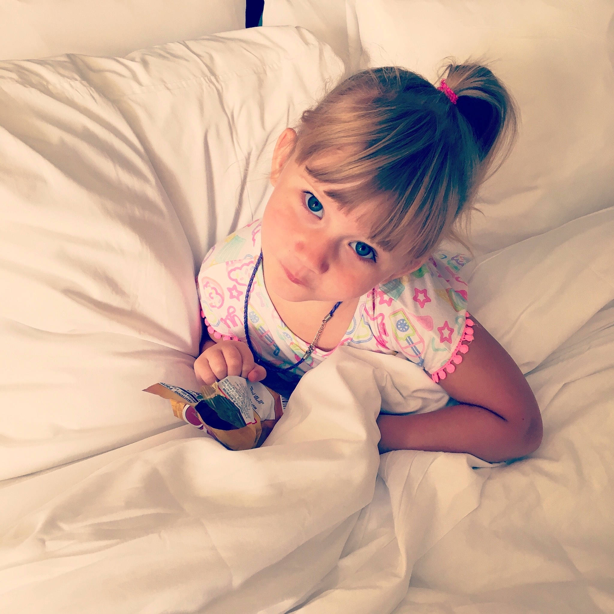 Amaryllis is registered to the contest to win money with this photo: arm, baby, bed_sheet, cheek, child, dress, ear, eye, eyelash, hair, joint, lip, mouth, nose, person, pink, purple, shoulder, skin, textile