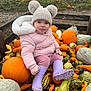 Isabelle joined the competition — help win amazing prizes! toddler, child, pumpkin, gourds, autumn, fall, hat, pom_poms, pink_jacket, purple_boots, muddy, outdoor, field, farm, cute, seasonal, nature, smile, person, playful