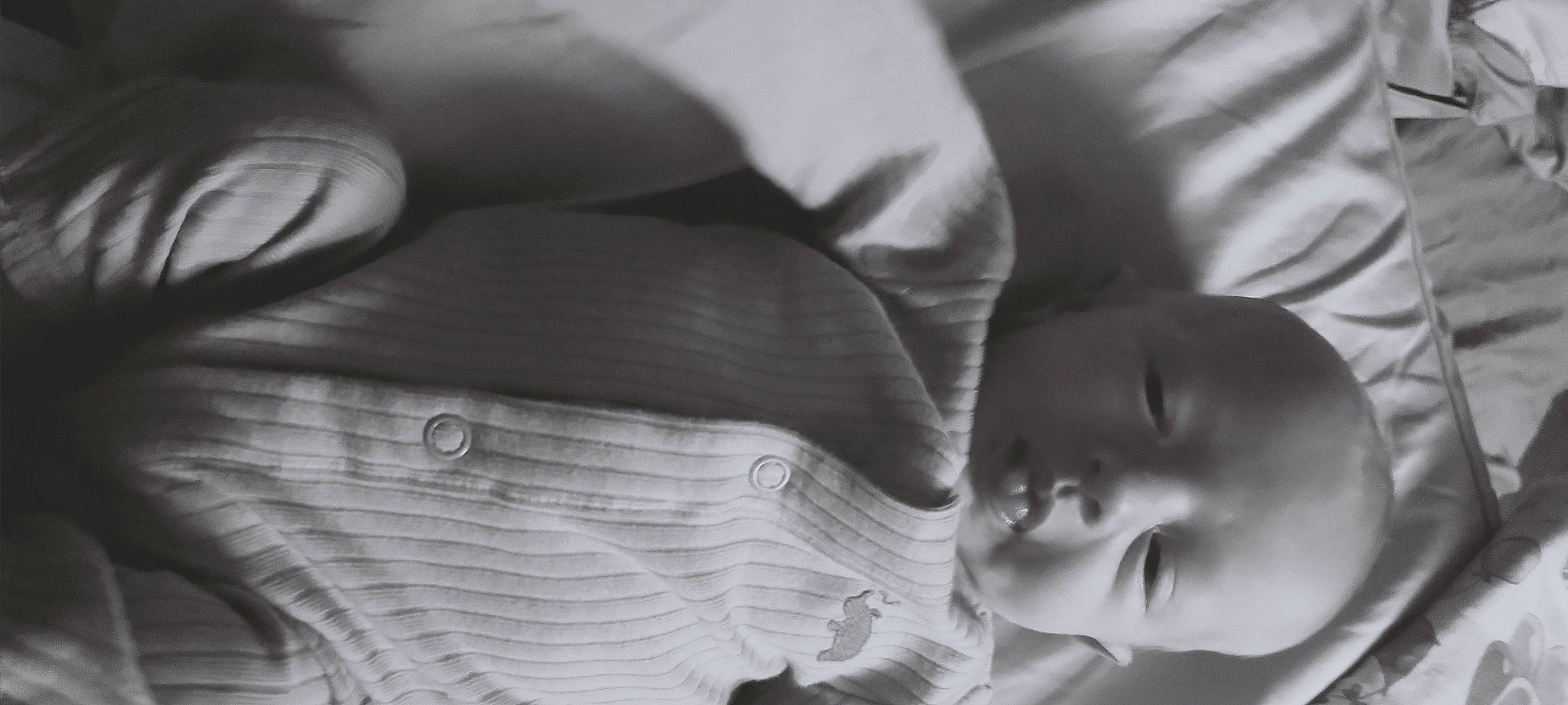 Jacob is registered to the contest to win money with this photo: arm, art, baby, black, black_and_white, child, close_up, comfort, finger, gesture, glasses, grey, hand, happy, iris, monochrome, monochrome_photography, mouth, person, style