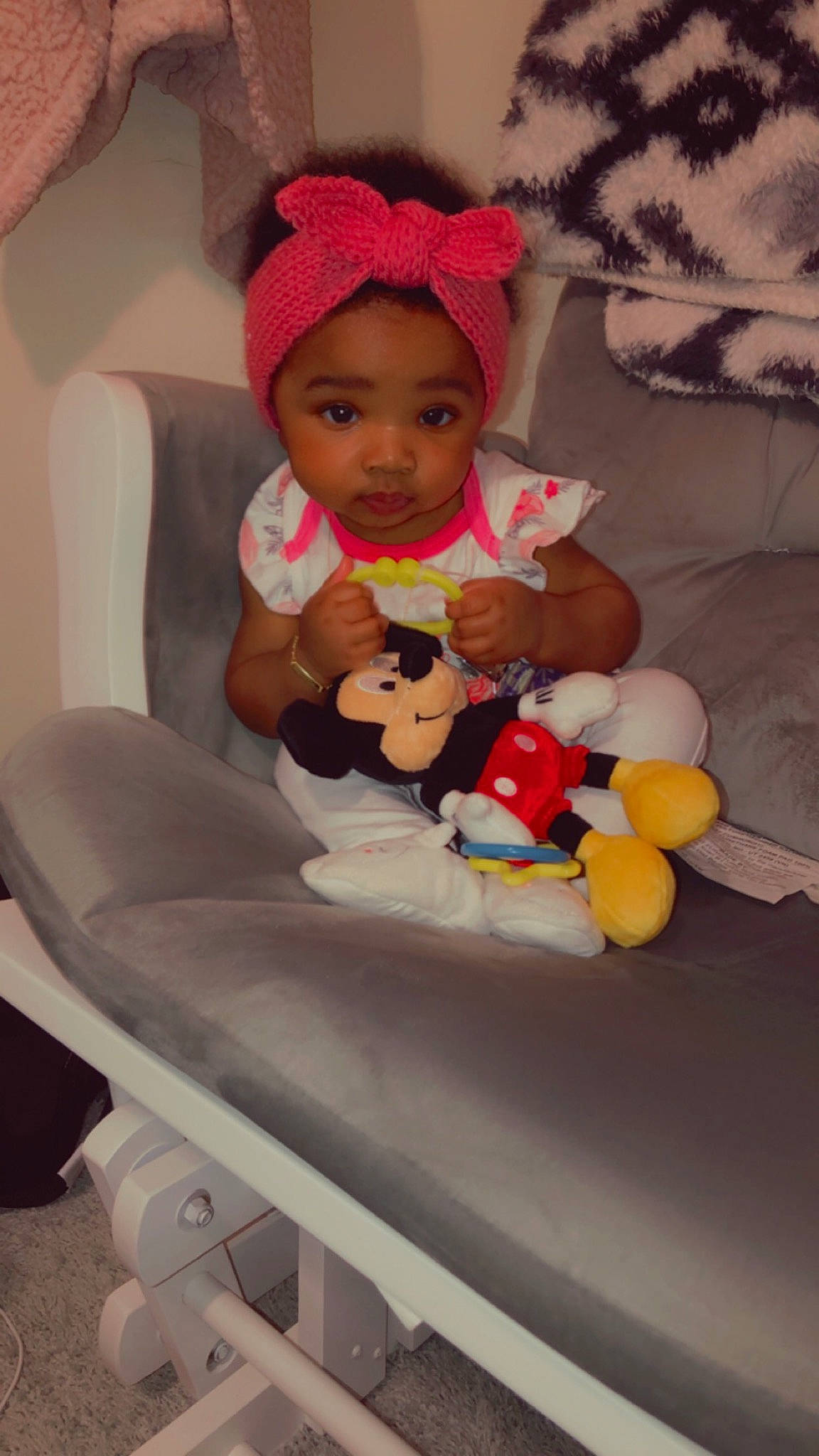 Anyla is registered to the contest to win money with this photo: baby, baby_products, baby_safety, baby_toddler_clothing, cap, chair, child, comfort, eye, hand, happy, headwear, lap, linens, person, room, sitting, skin, stuffed_toy, teddy_bear