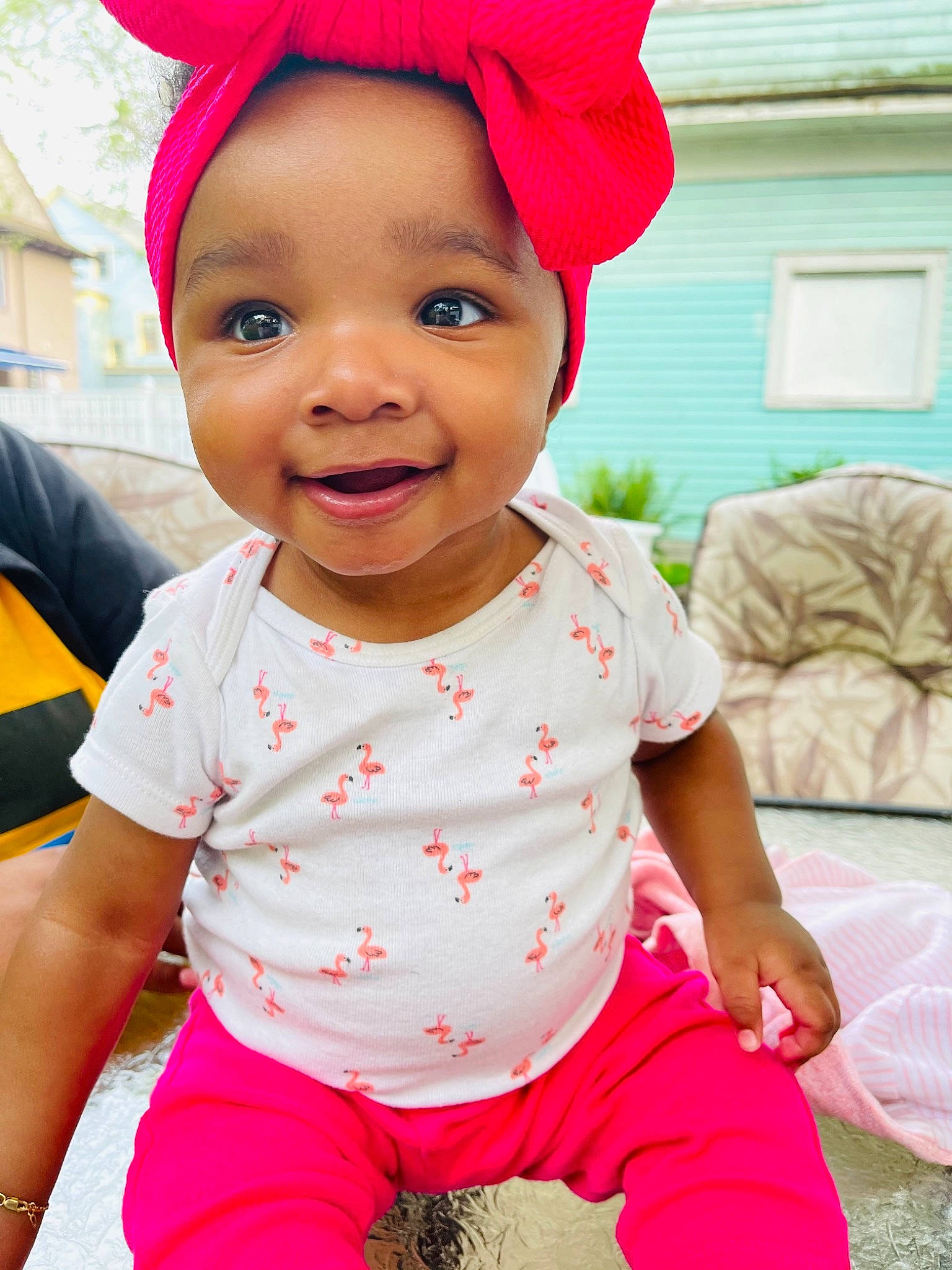 Anyla joined the competition — help win amazing prizes! baby_toddler_clothing, cap, chin, clothing, eye, face, green, hairstyle, happy, head, human_body, joy, person, picture_frame, pink, product, red, skin, sleeve, smile