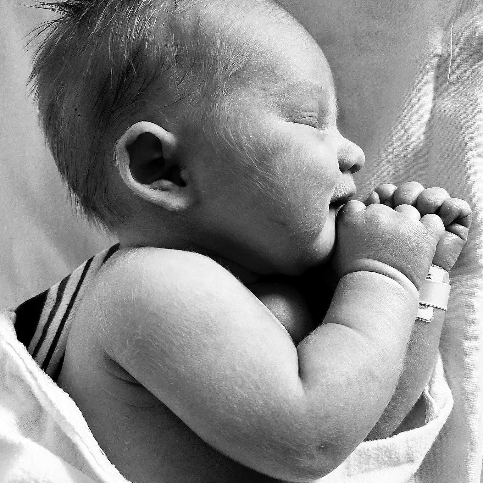 Nolan Ryan joined the competition — help win amazing prizes! arm, baby, baby_sleeping, chest, child, chin, comfort, elbow, finger, gesture, hand, happy, human_body, interaction, mouth, nose, skin, stomach, toddler, white