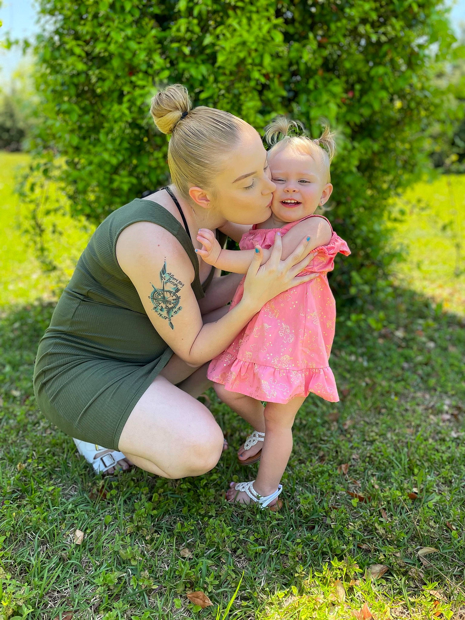 Audrey is registered to the contest to win money with this photo: baby, child, event, eye, fun, garden, gesture, grass, grass_family, grassland, happy, lawn, leisure, meadow, people_in_nature, person, plant, recreation, smile, toddler