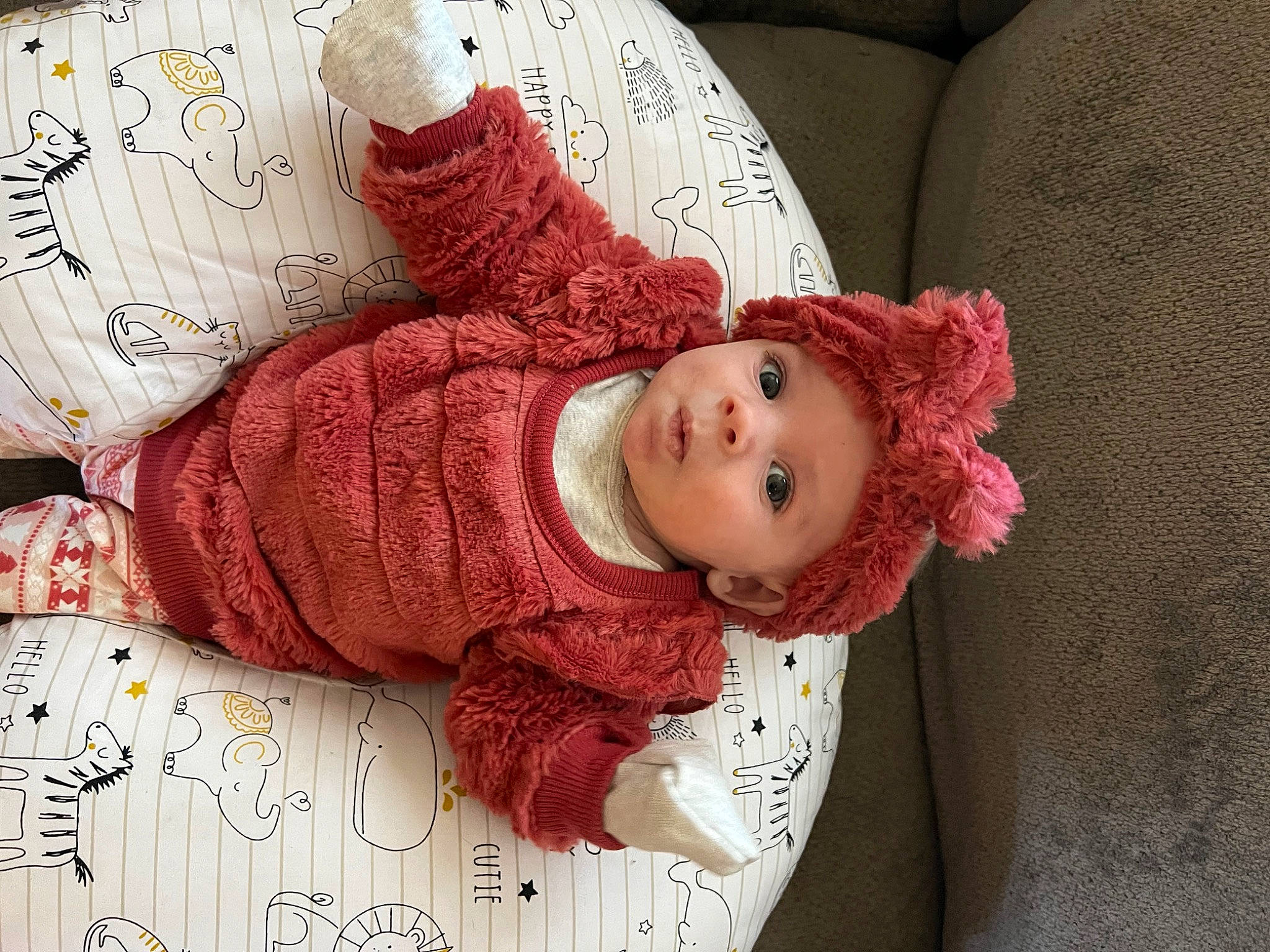 Emelia joined the competition — help win amazing prizes! arm, baby, baby_toddler_clothing, cheek, child, comfort, hand, headgear, headwear, human_body, linens, lip, magenta, pattern, person, pink, room, skin, sleeve, textile
