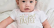 Callia is registered to the contest to win money with this photo: baby, blanket, bow, celebration, child, cute, earrings, easter, face, headband, holiday, indoors, infant, pink_tutu, portrait, sitting, smiling, soft_texture, white_clothing, young_child
