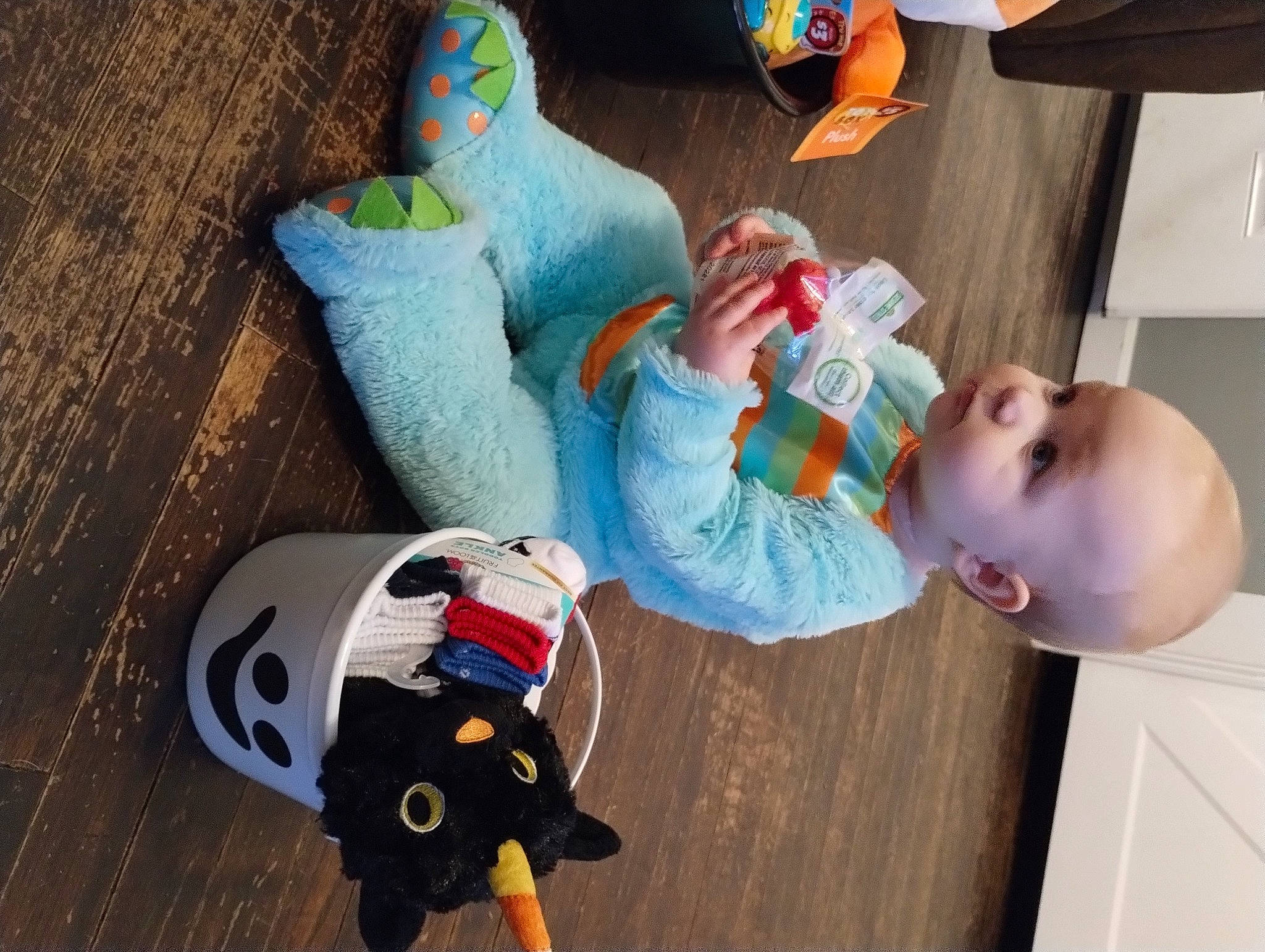 Westin is registered to the contest to win money with this photo: baby, baby_products, baby_toddler_clothing, baby_toys, carmine, child, comfort, flooring, fun, happy, hardwood, person, play, plush, room, sitting, stuffed_toy, textile, toddler, toy
