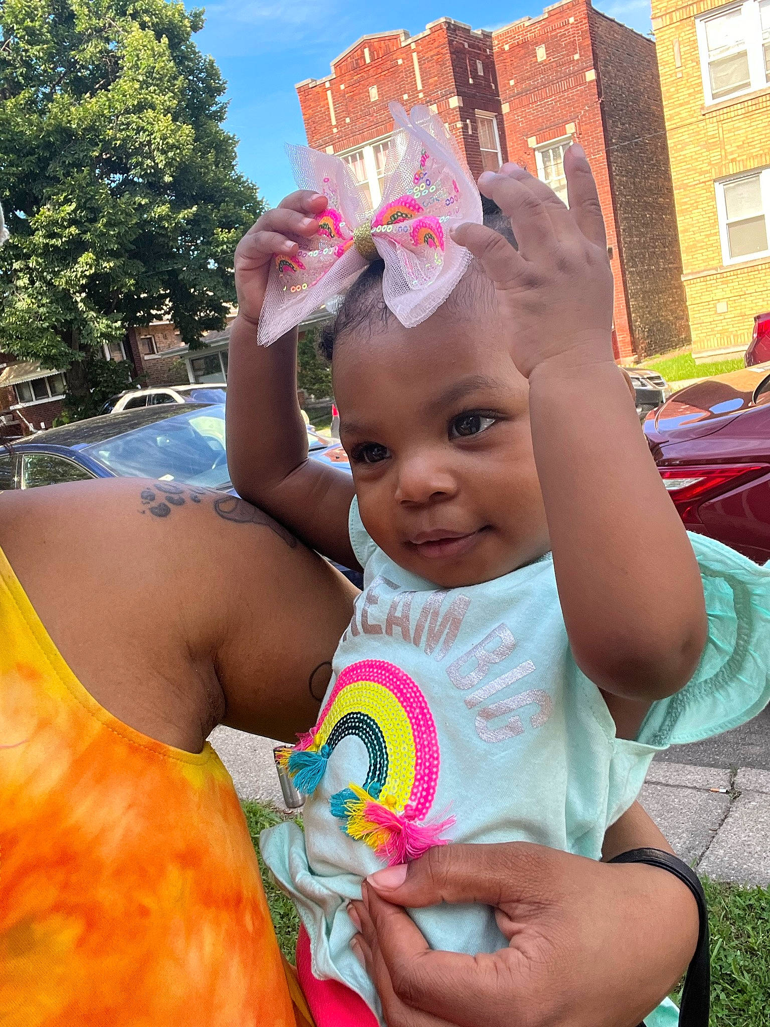 Damyla is registered to the contest to win money with this photo: baby, chest, child, event, fun, grass, happy, leisure, magenta, person, pink, play, recreation, skin, sky, smile, summer, toddler, tree, trunk