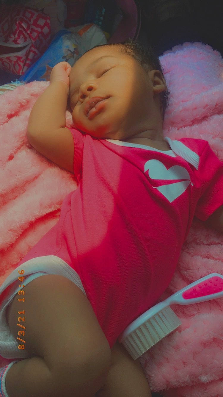 Damyla is registered to the contest to win money with this photo: abdomen, baby, baby_sleeping, baby_toddler_clothing, beauty, cheek, child, comfort, elbow, happy, human_body, human_leg, linens, magenta, mouth, person, pink, skin, t_shirt, thigh