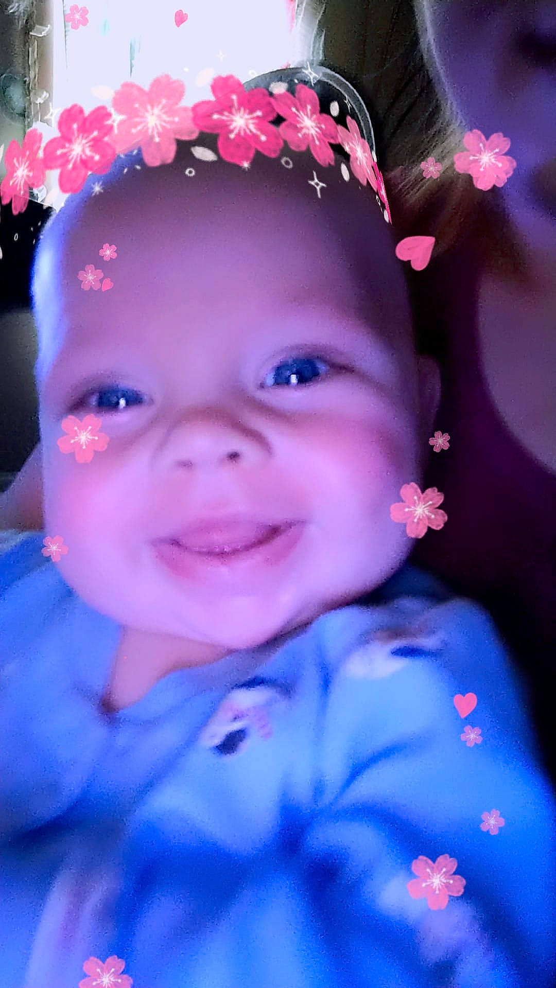 Ruger joined the competition — help win amazing prizes! beauty, blue, cheek, child, eye, face, facial_expression, flower, fun, girl, hair_accessory, head, infant, joy, nose, person, pink, purple, skin, smile