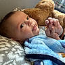 Henry joined the competition — help win amazing prizes! baby, infant, child, smiling, portrait, close_up, lying_down, hands, teddy_bear, stuffed_animal, blue_blanket, blanket, cushion, cozy, indoor, nursery, baby_clothing, happy, face, photography