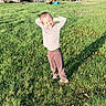 Blaise joined the competition — help win amazing prizes! child, grass, smiling, outdoor, sunlight, tree, house, car, flower, yard, casual_clothing, happy, standing, daytime, nature, greenery, playful, person, shoes, leisure