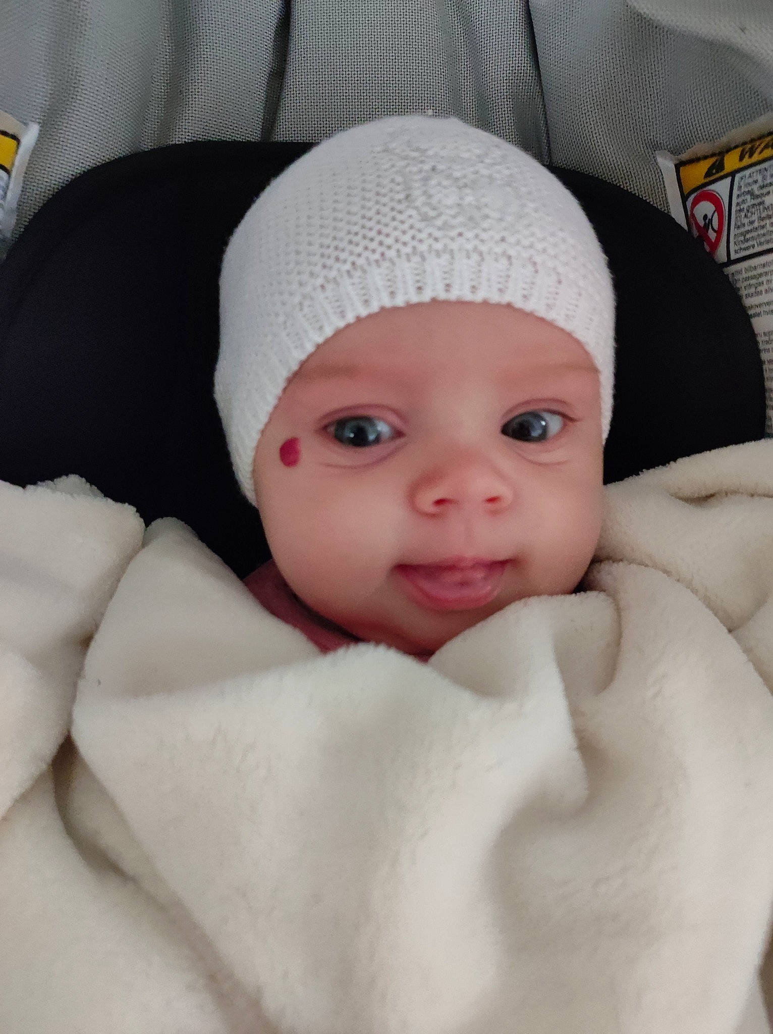 Liza participe au concours pour gagner de l'argent avec cette photo : baby, baby_sleeping, beanie, cap, cheek, child, comfort, eyebrow, eyelash, fashion_accessory, headgear, headwear, knit_cap, linens, lip, person, skin, smile, textile, thumb