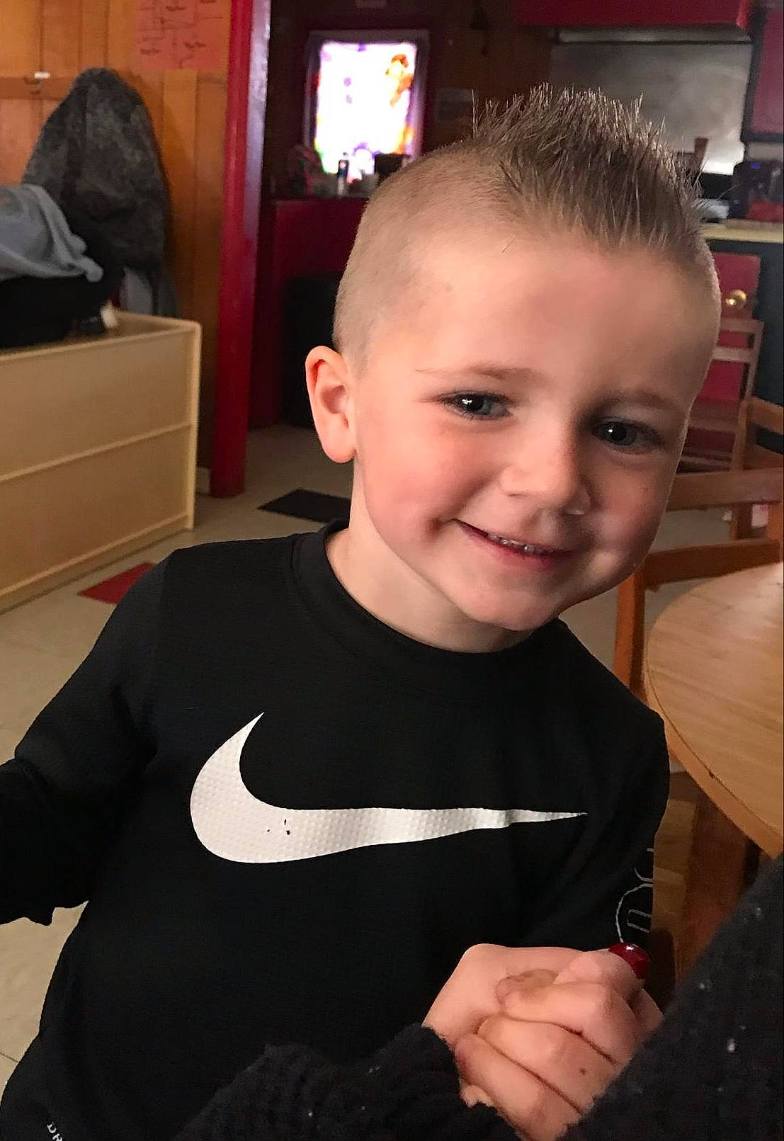 Casey is registered to the contest to win money with this photo: arm, buzz_cut, cheek, child, ear, eyebrow, face, facial_expression, forehead, fun, hair, hairstyle, head, joy, person, smile, t_shirt, toddler, tooth