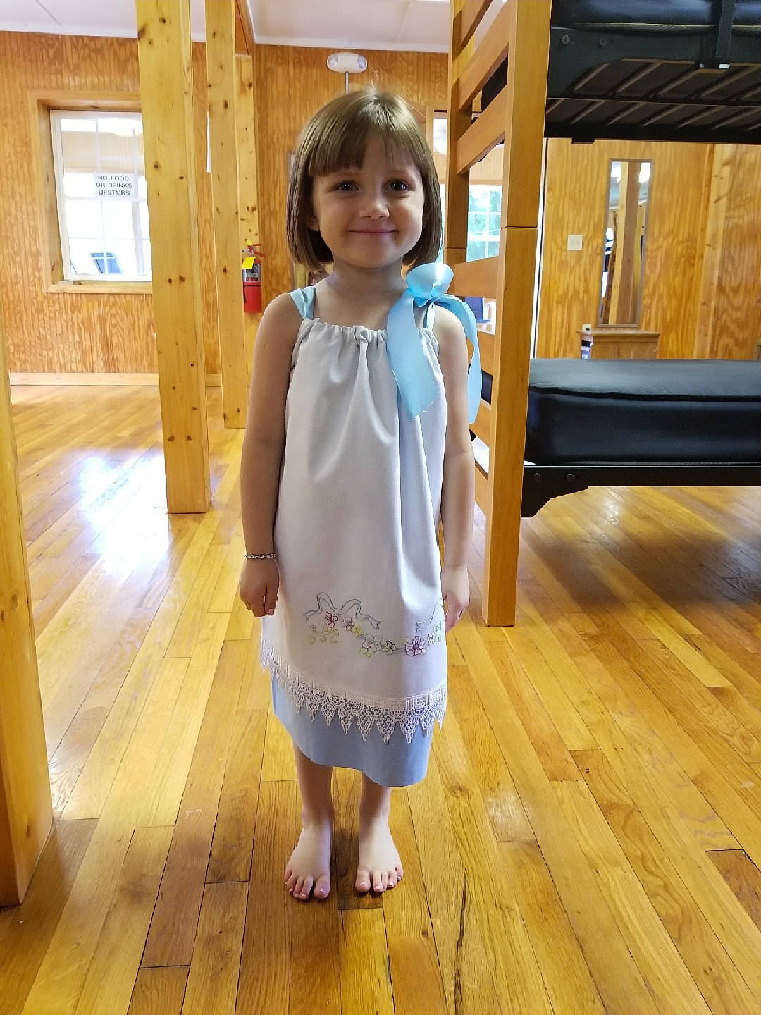 Larkin is registered to the contest to win money with this photo: child, clothing, dress, floor, flooring, hardwood, joy, person, standing, toddler, wood, wood_flooring