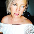 Sabrina B.