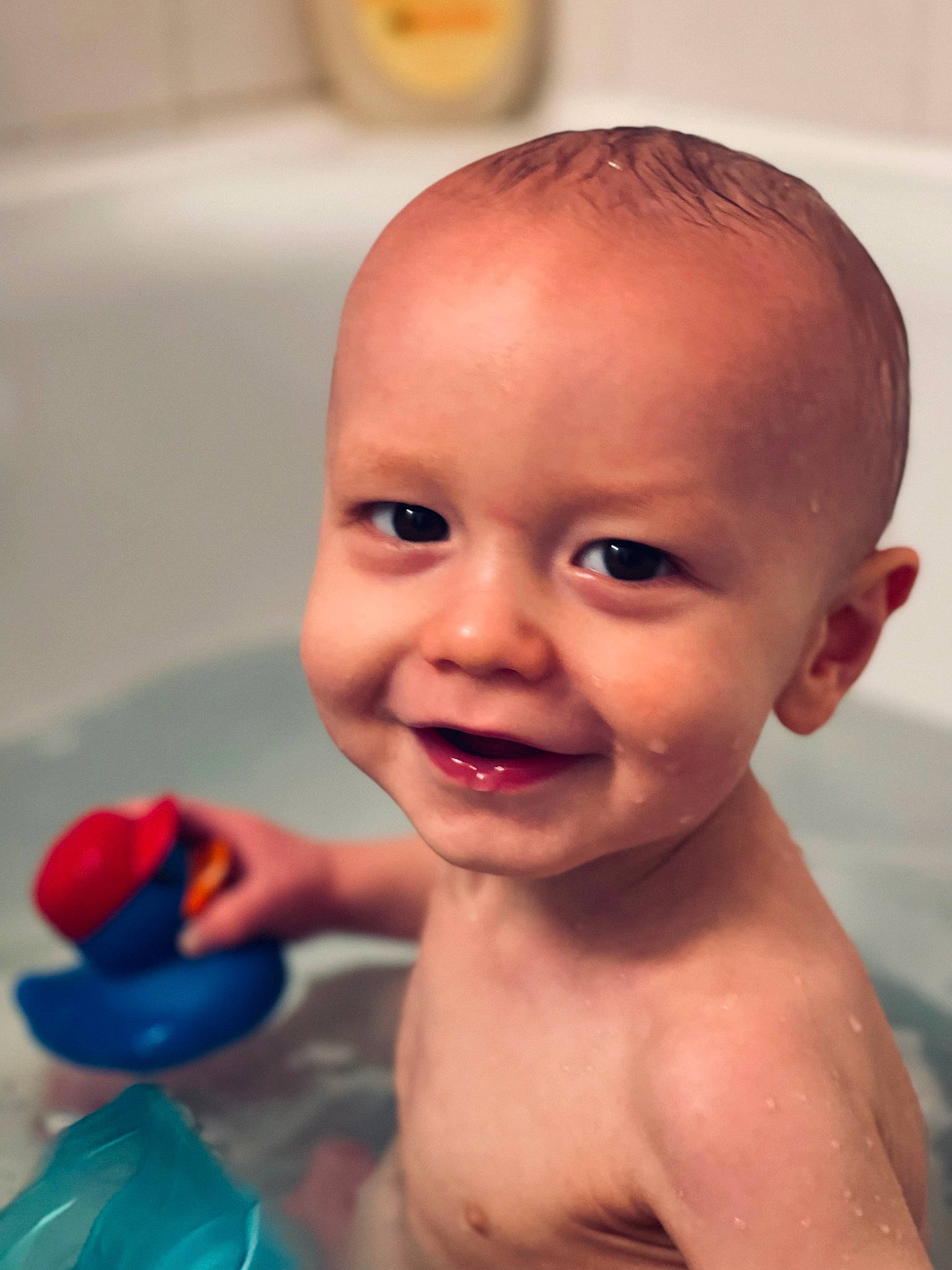 Kannon is registered to the contest to win money with this photo: baby, baby_bathing, bath_toy, bathing, bathroom, cheek, ear, eyelash, fluid, happy, human_body, iris, joy, leisure, lip, mouth, nose, person, skin, smile