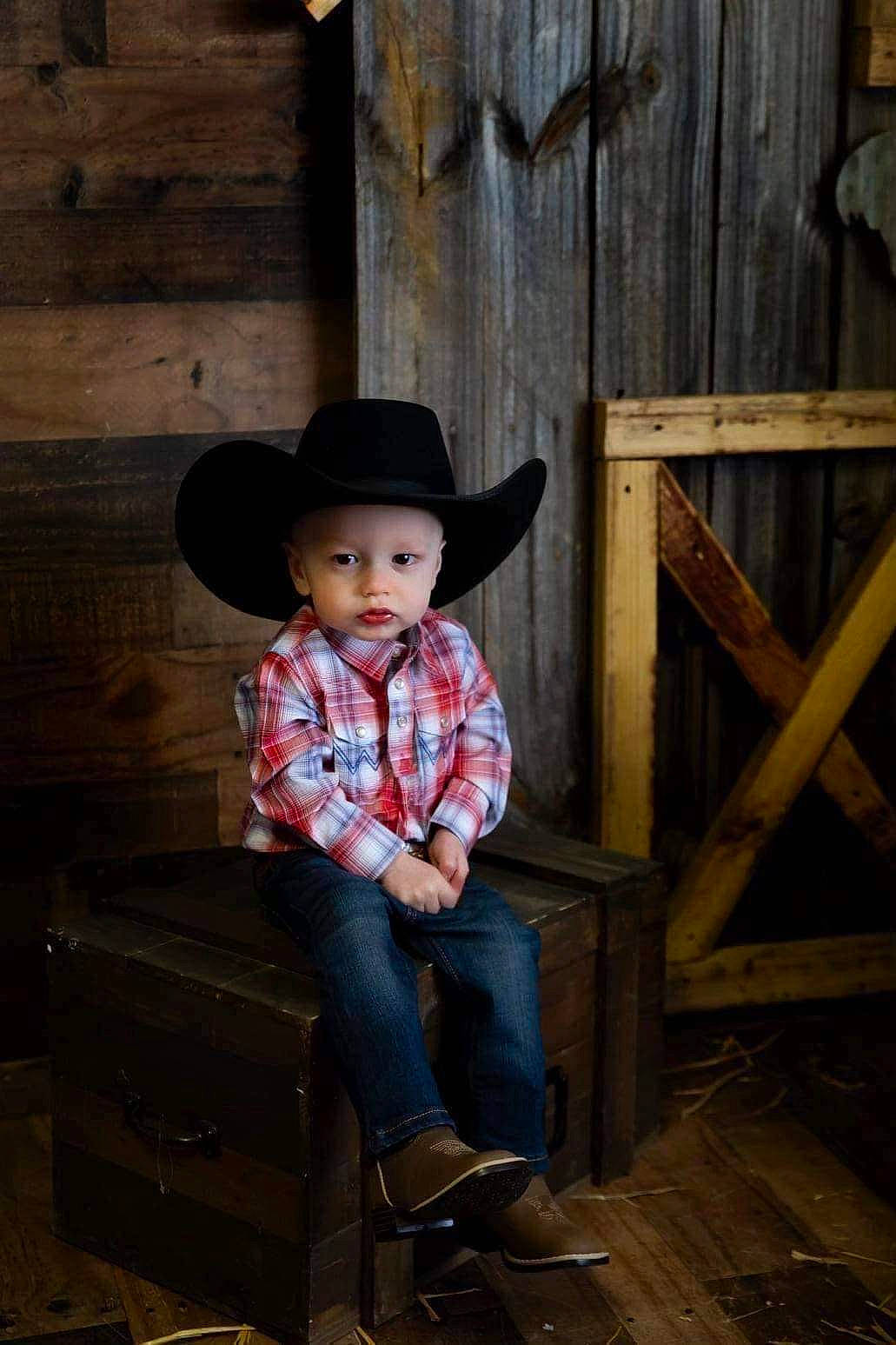 Kannon joined the competition — help win amazing prizes! baby_toddler_clothing, cowboy_hat, denim, flash_photography, fun, happy, hat, headgear, headwear, jeans, magenta, pattern, person, plaid, plant, sitting, sleeve, smile, sun_hat, toddler