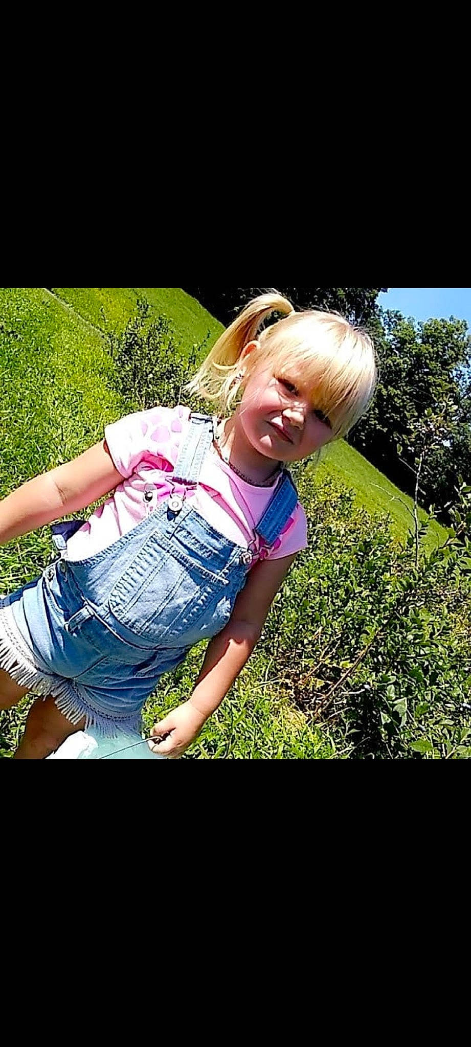 Blaire joined the competition — help win amazing prizes! beauty, botany, cool, facial_expression, flash_photography, grass, hair, hairstyle, happy, human_body, leisure, magenta, meadow, people_in_nature, person, plant, smile, sunlight, thigh, tints_and_shades