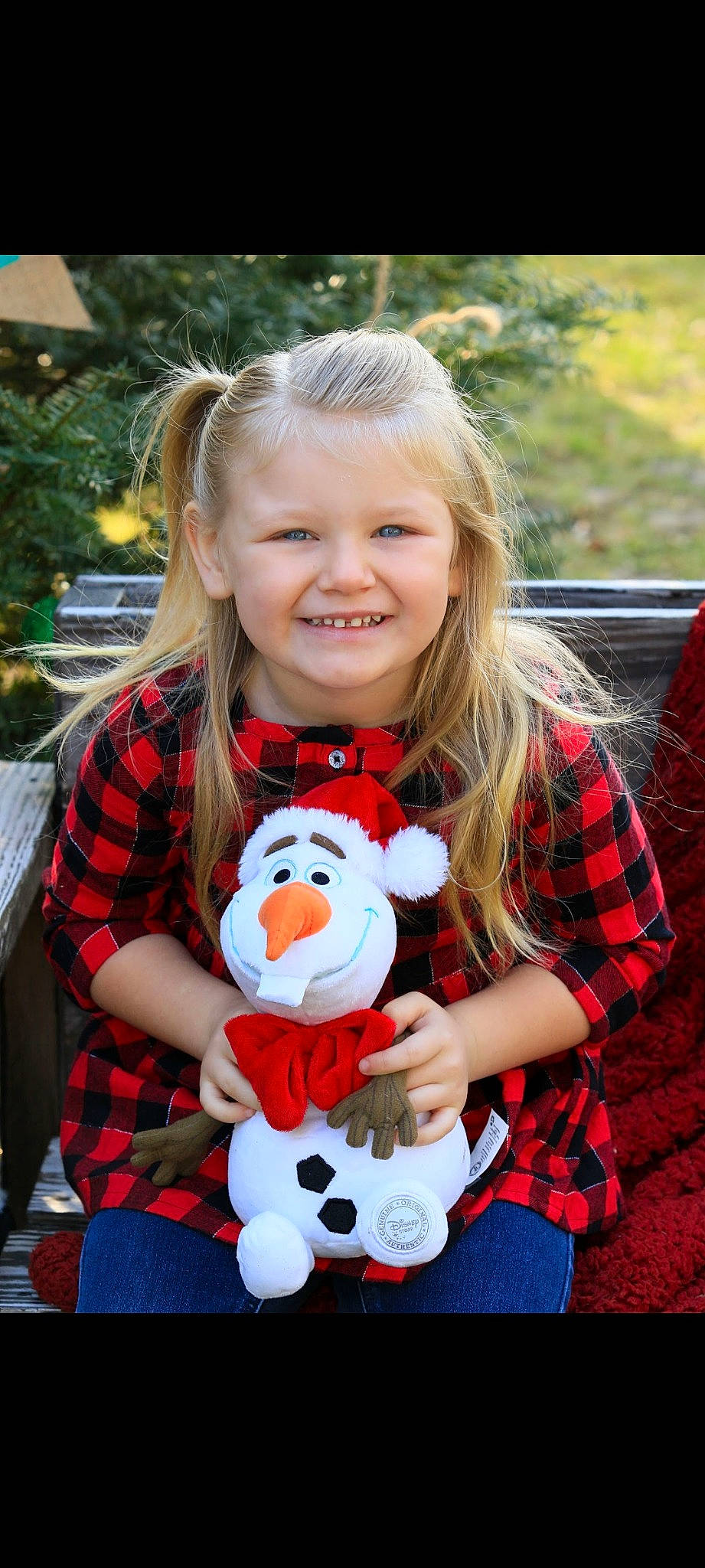 Blaire joined the competition — help win amazing prizes! child, event, fun, grass, happy, head, jeans, joy, lap, leisure, mammal, person, pink, plaid, recreation, red, smile, stuffed_toy, tartan, teddy_bear