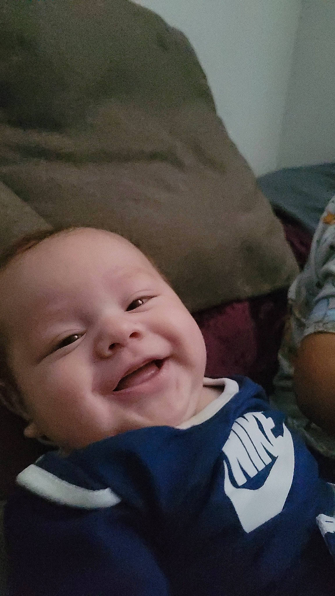 Luis is registered to the contest to win money with this photo: baby, baby_toddler_clothing, cheek, child, comfort, eyebrow, flash_photography, fun, happy, iris, joy, laugh, linens, lip, mouth, person, portrait_photography, smile, toddler