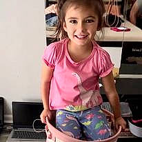 Lennon joined the competition — help win amazing prizes! beauty, blond, child, computer, hair, happy, human_leg, joy, laptop, organ, person, photograph, pink, shorts, sleeve, smile, snapshot, t_shirt, table, thigh