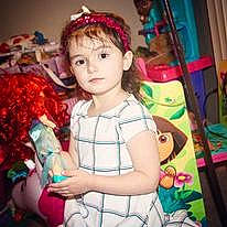 Lennon is registered to the contest to win money with this photo: baby_toddler_clothing, child, curtain, event, fashion_accessory, fun, fur, happy, headpiece, holiday, iris, magenta, pattern, person, pink, play, room, t_shirt, textile, toddler