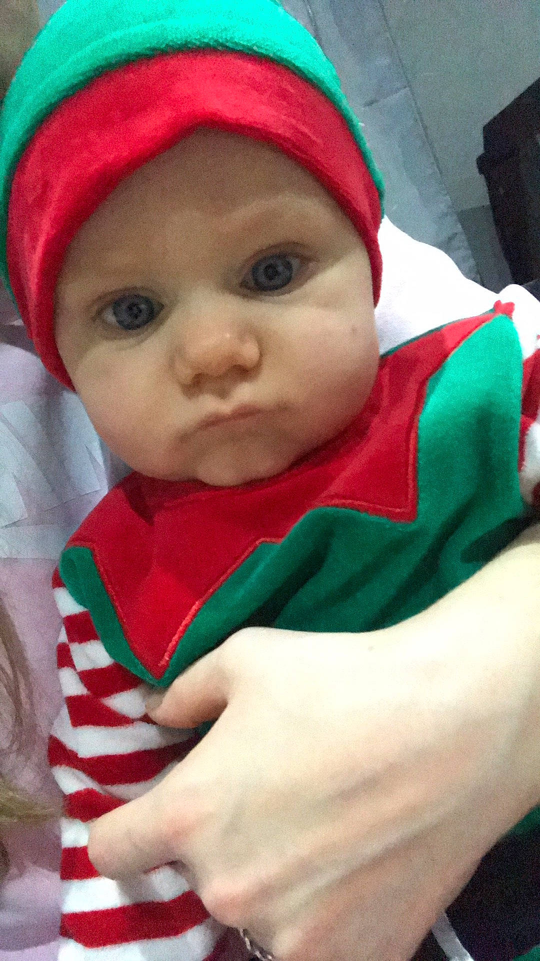 Thiago a rejoint le concours — aidez-le/la à gagner de superbes lots ! baby, baby_toddler_clothing, cap, cheek, child, eye, face, fictional_character, green, happy, head, headgear, headwear, holiday, human_body, jacket, knit_cap, lip, nose, person