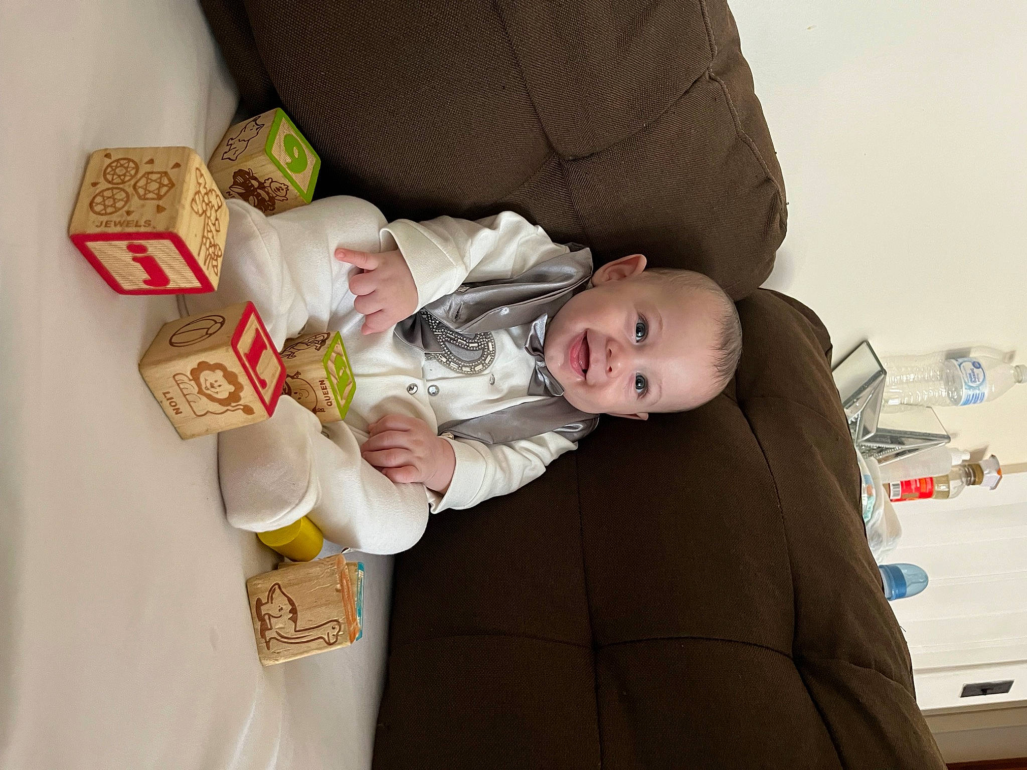 Jaizayden is registered to the contest to win money with this photo: baby, baby_products, baby_toddler_clothing, child, comfort, event, happy, paper, paper_product, person, room, sitting, smile, toddler, wood