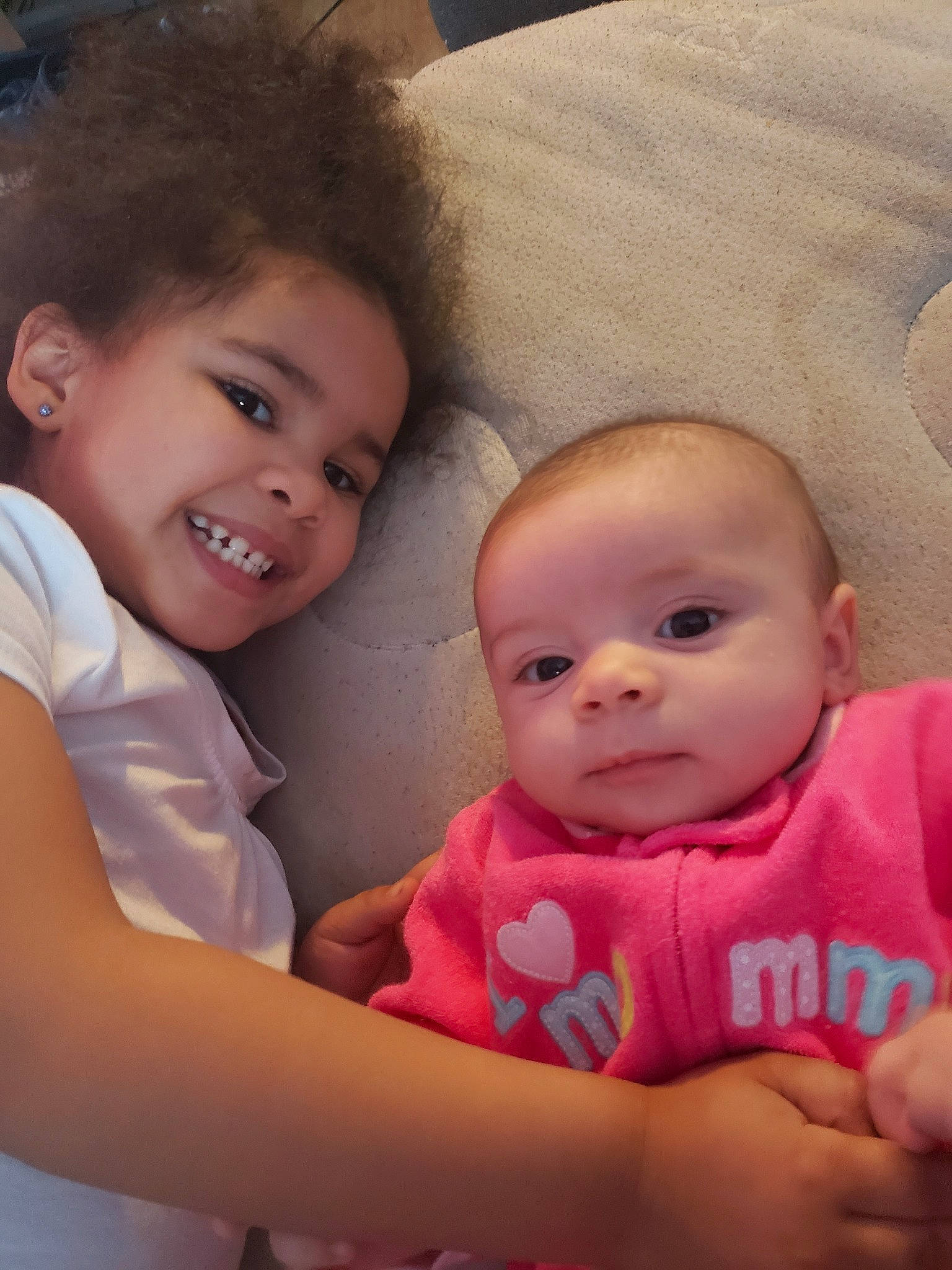 Lillian Rose is registered to the contest to win money with this photo: baby, cheek, child, eye, face, fun, happy, head, iris, joy, lip, mouth, nose, person, pink, sibling, skin, smile, toddler