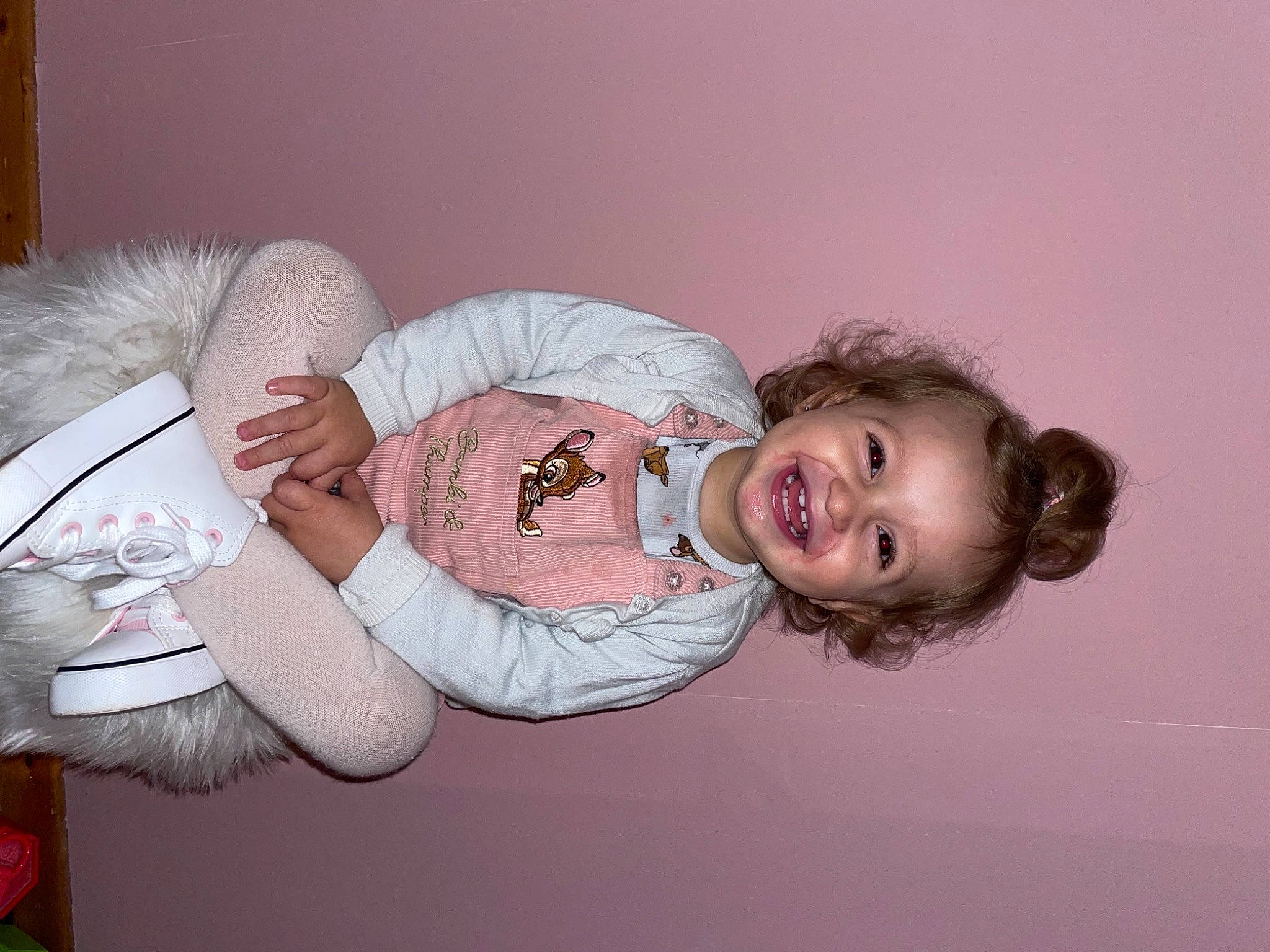 Myla participe au concours pour gagner de l'argent avec cette photo : baby, baby_products, baby_sleeping, baby_toddler_clothing, cheek, child, comfort, flash_photography, fun, fur, happy, headgear, joy, linens, person, pink, portrait_photography, room, sitting, sleeve