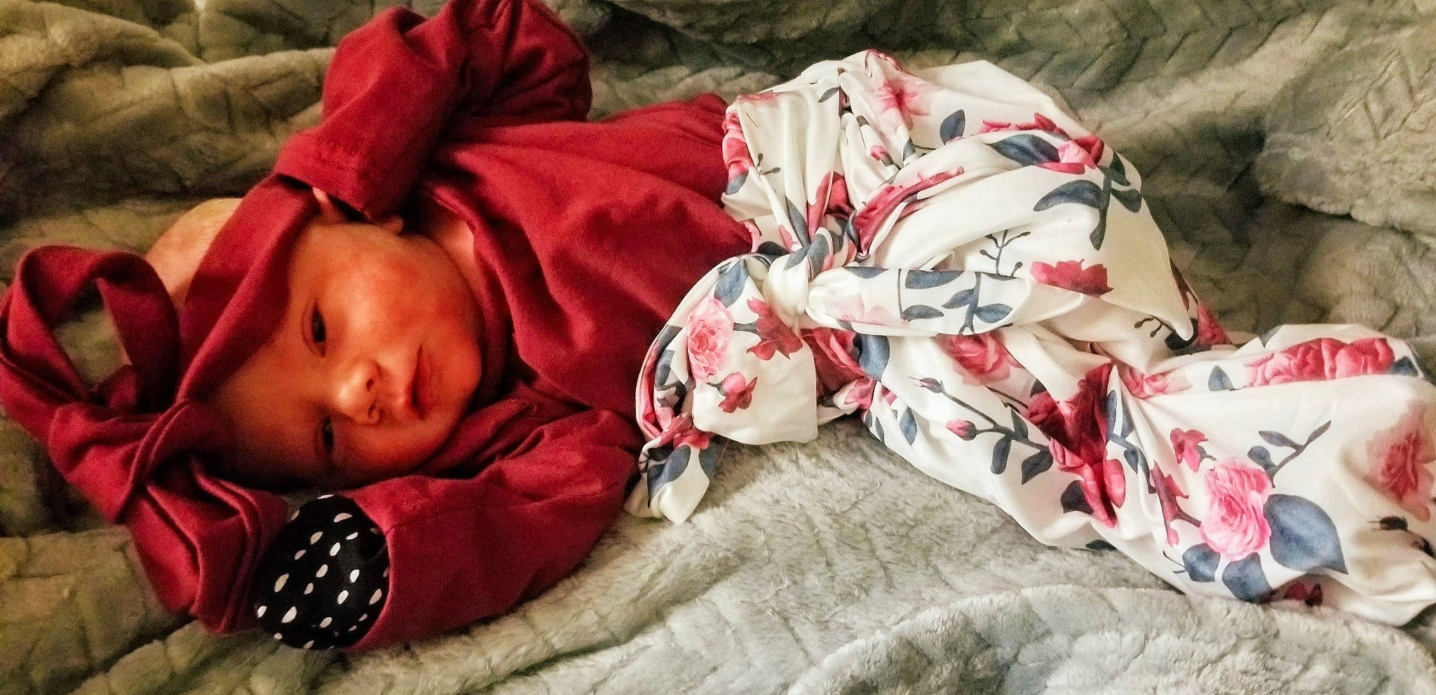 Rayne is registered to the contest to win money with this photo: baby, baby_toddler_clothing, bedding, bedtime, carmine, child, christmas, comfort, fashion_accessory, flesh, fur, headwear, illustration, linens, nap, pattern, person, plaid, room, sleeve