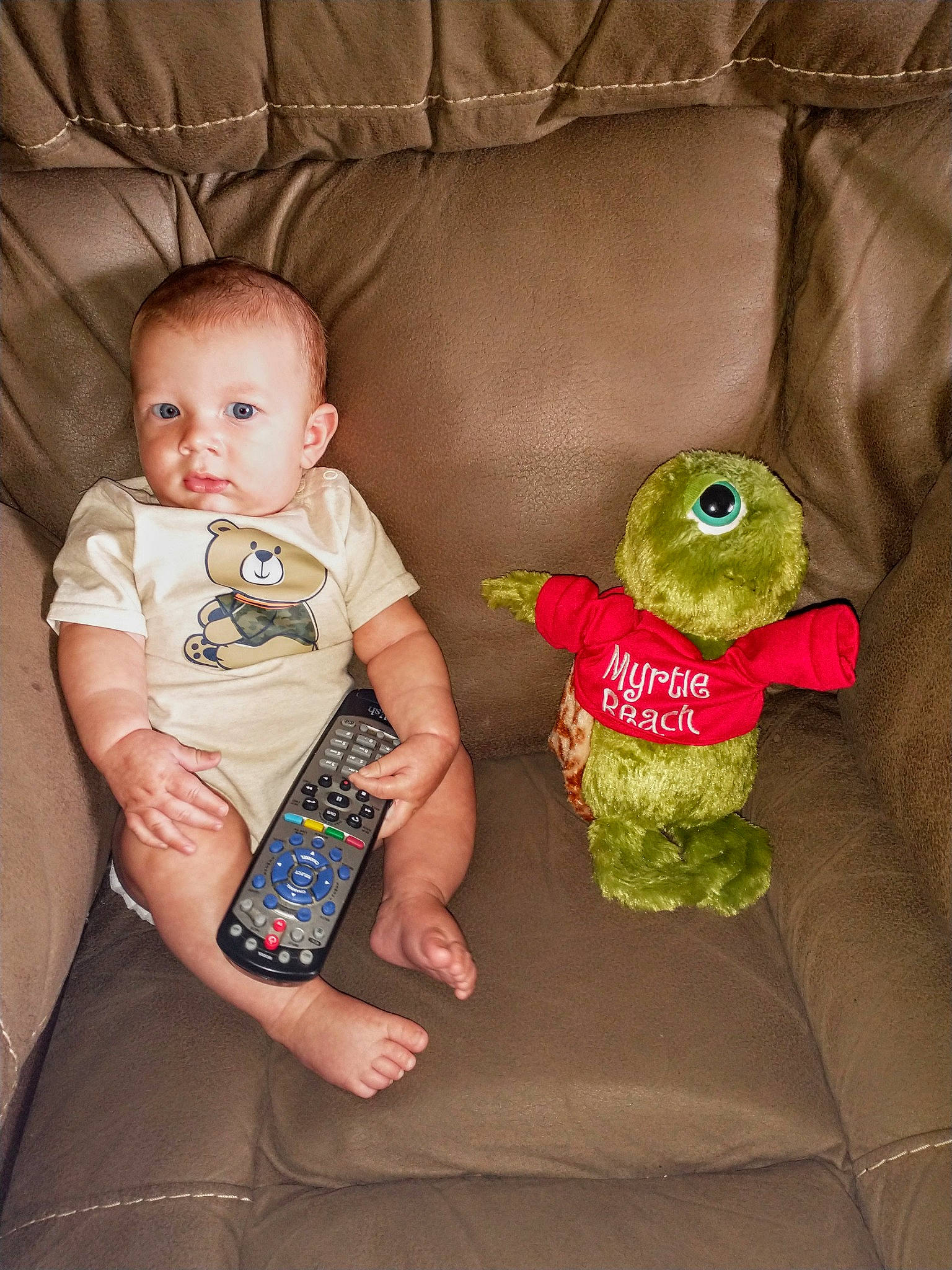 Logan Ezra joined the competition — help win amazing prizes! baby, baby_products, baby_toddler_clothing, cheek, child, comfort, communication_device, head, lap, linens, mammal, organ, person, product, room, sitting, skin, stuffed_toy, textile, toddler