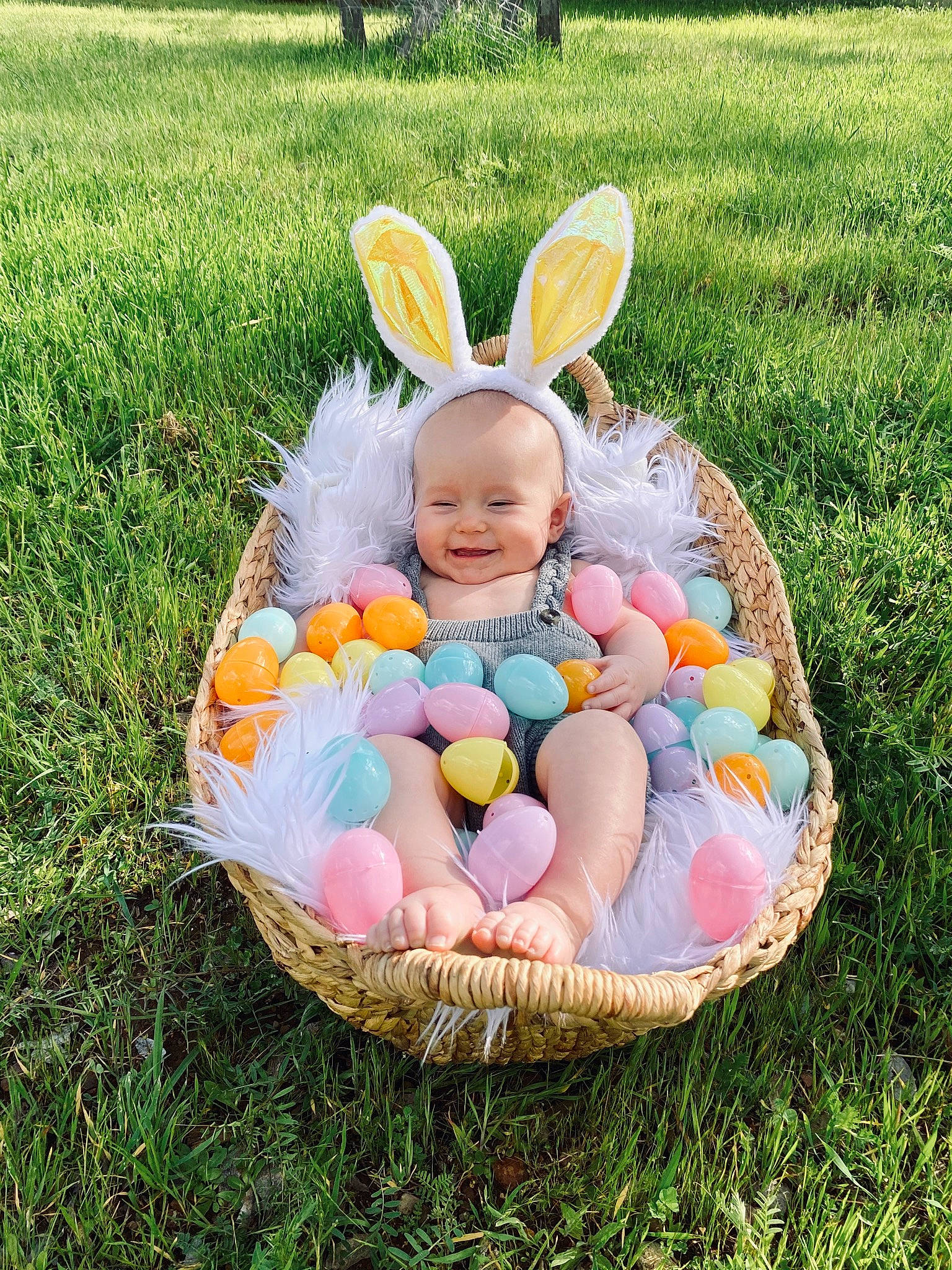 Everette joined the competition — help win amazing prizes! baby, basket, child, ear, easter, easter_bunny, easter_egg, food, grass, holiday, joy, person, product, toddler