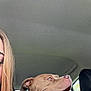 Stella participe au concours pour gagner de l'argent avec cette photo : dog, car, animal, pet, tongue_out, happy, collar, seat, window, person_partial, blonde_hair, denim_jacket, inside, transportation, smiling, canine, side_view, seatbelt, head, domestic_animal