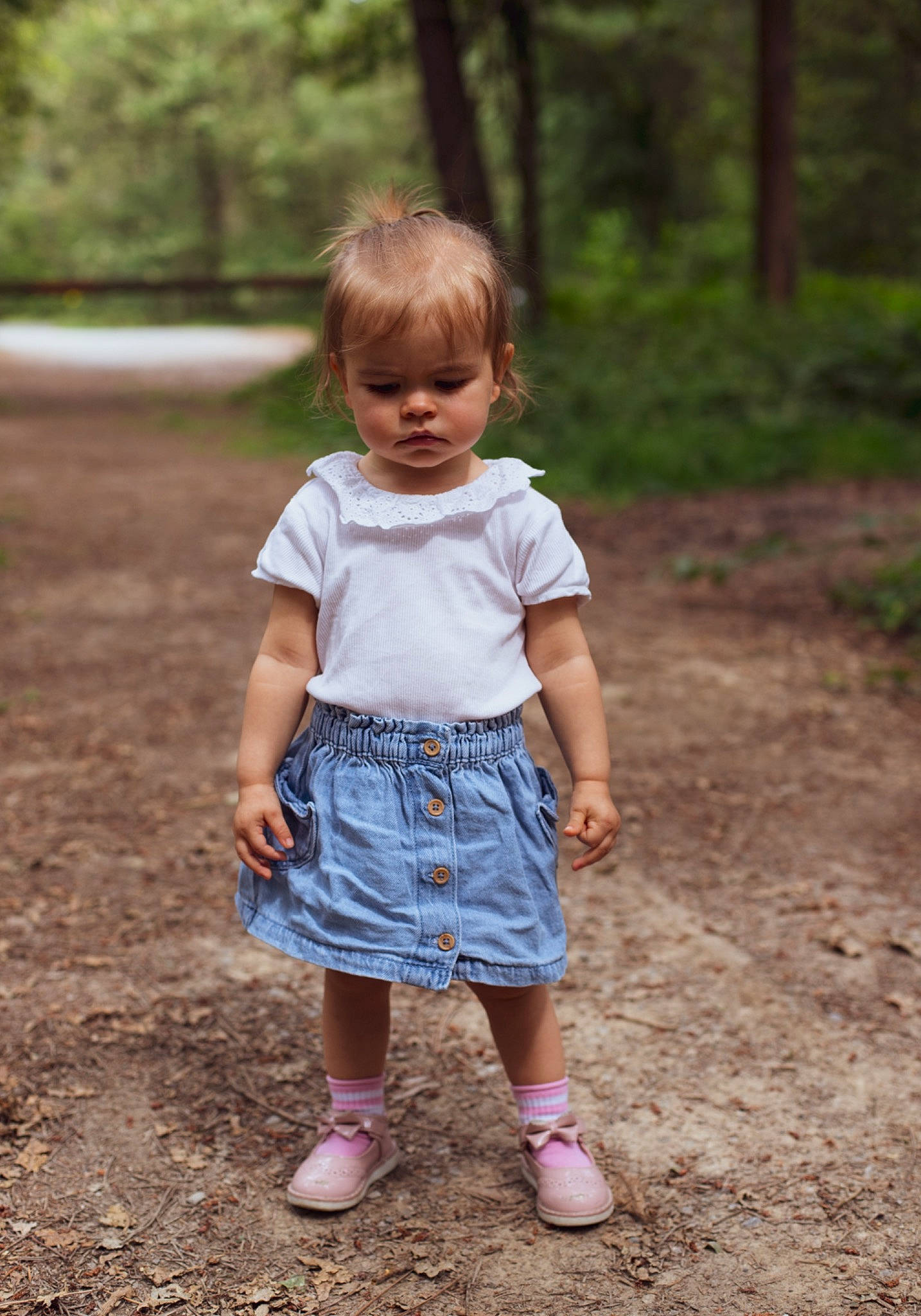 Liyah participe au concours pour gagner de l'argent avec cette photo : baby_toddler_clothing, child, denim, footwear, forest, fun, grass, hairstyle, happy, leisure, pattern, people_in_nature, person, pink, plaid, plant, recreation, sunlight, toddler, tree