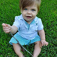 Wylie is registered to the contest to win money with this photo: barefoot, blue_eyes, casual_clothing, child, cute, grass, green, happy, nature, outdoor, person, playful, short_hair, sitting, stick, striped_skirt, summer, toddler, white_shirt, young_child