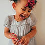 Serenity is registered to the contest to win money with this photo: accessories, baby, babylaughing, bodypart, child, clothing, dress, face, female, finger, girl, hand, happy, head, jewelry, laughing, person, photography, portrait, smile