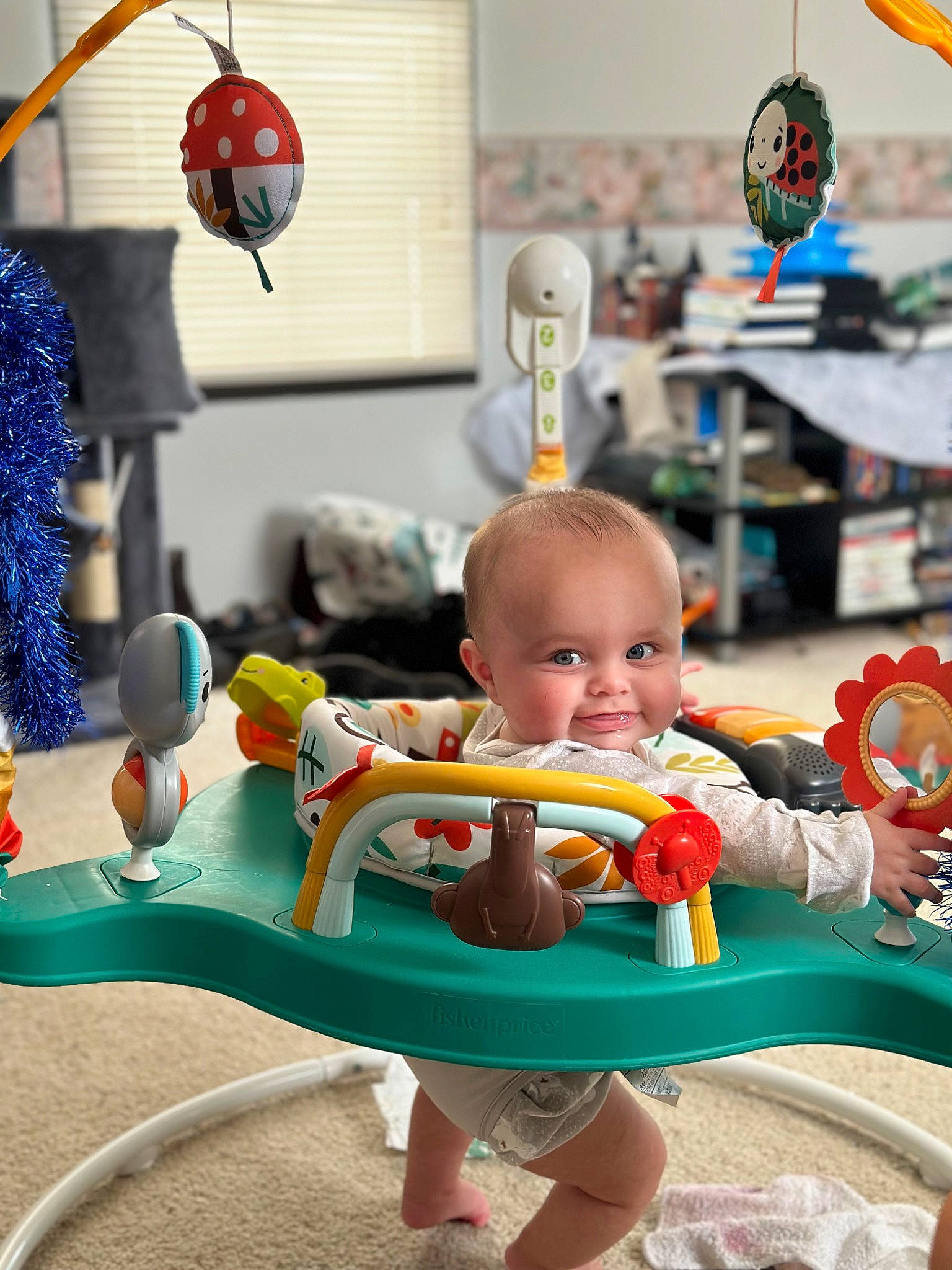 Brantley is registered to the contest to win money with this photo: baby, baby_mobile, baby_playing_with_toys, baby_products, baby_toddler_clothing, baby_toys, blue, child, fun, happy, joy, leisure, person, plastic, play, recreation, room, sitting, stuffed_toy, toddler